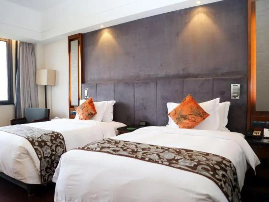 Bed in Worldhotel Grand Dushulake Suzhou