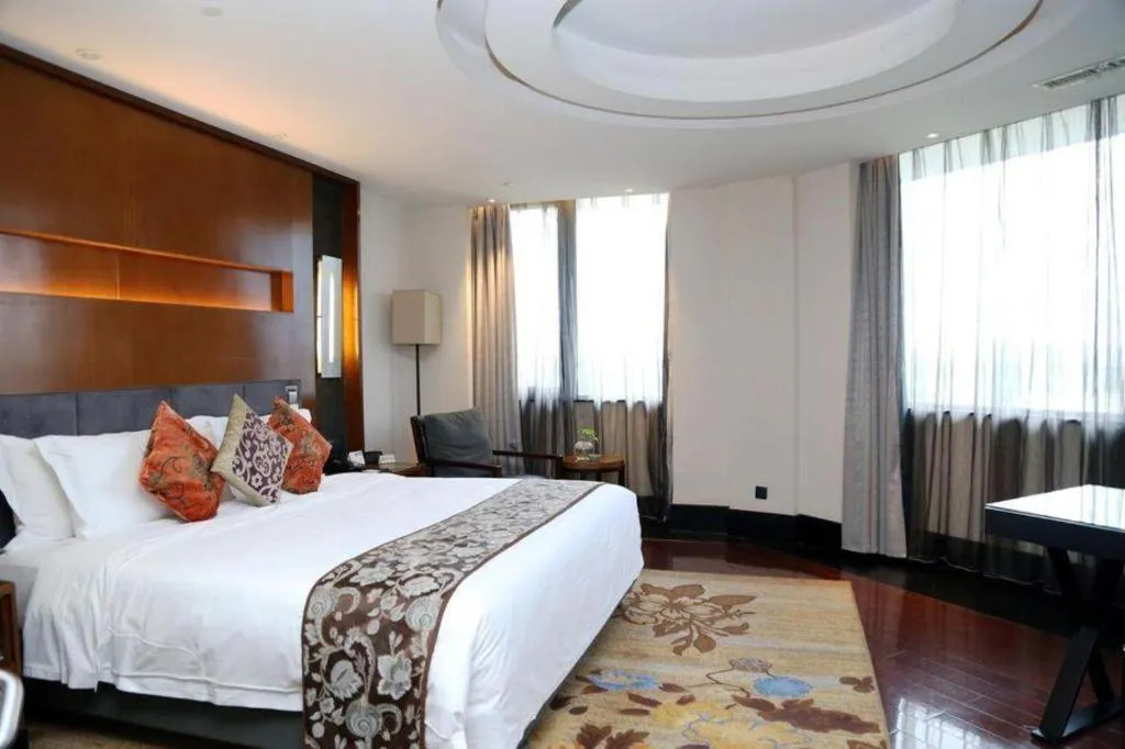 Bed in Worldhotel Grand Dushulake Suzhou