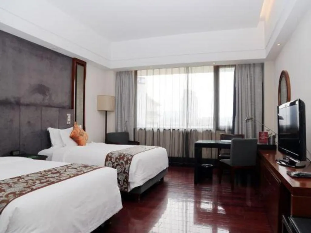 Bed in Worldhotel Grand Dushulake Suzhou