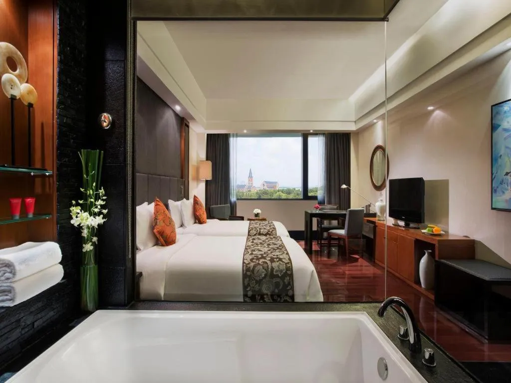 Bed in Worldhotel Grand Dushulake Suzhou