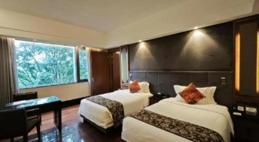 Bed in Worldhotel Grand Dushulake Suzhou