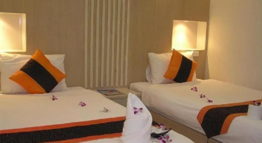 Bed in The Impress Khonkaen Hotel
