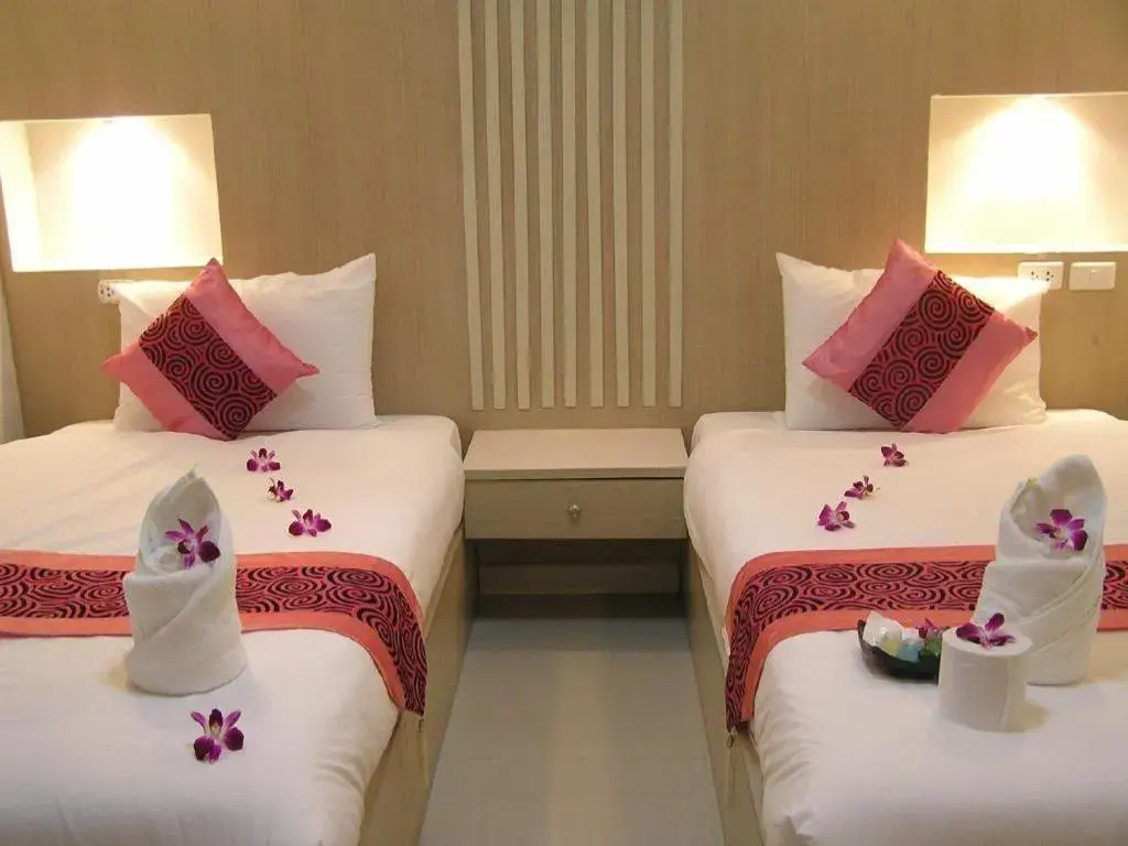 Bed in The Impress Khonkaen Hotel Bed in The Impress Khonkaen Hotel