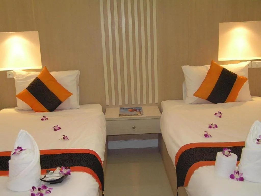 Bed in The Impress Khonkaen Hotel