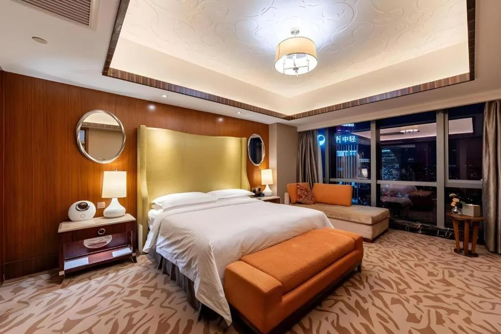 Bed in Kun Tai Glory Hotel Beijing Wangjing