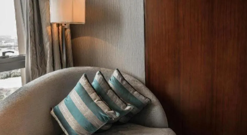 Bed in Kun Tai Glory Hotel Beijing Wangjing