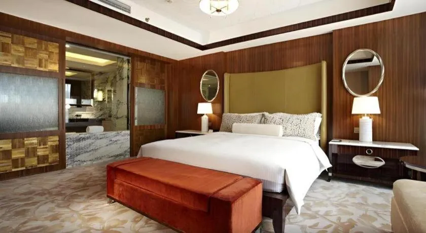 Bed in Kun Tai Glory Hotel Beijing Wangjing