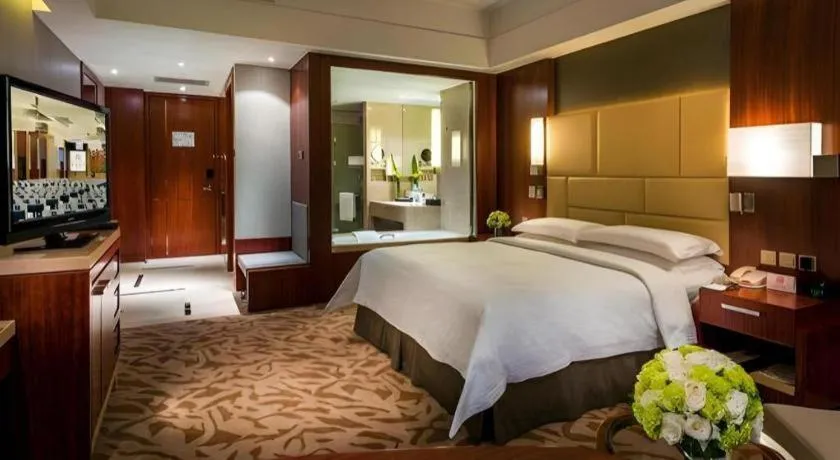 Bed in Kun Tai Glory Hotel Beijing Wangjing