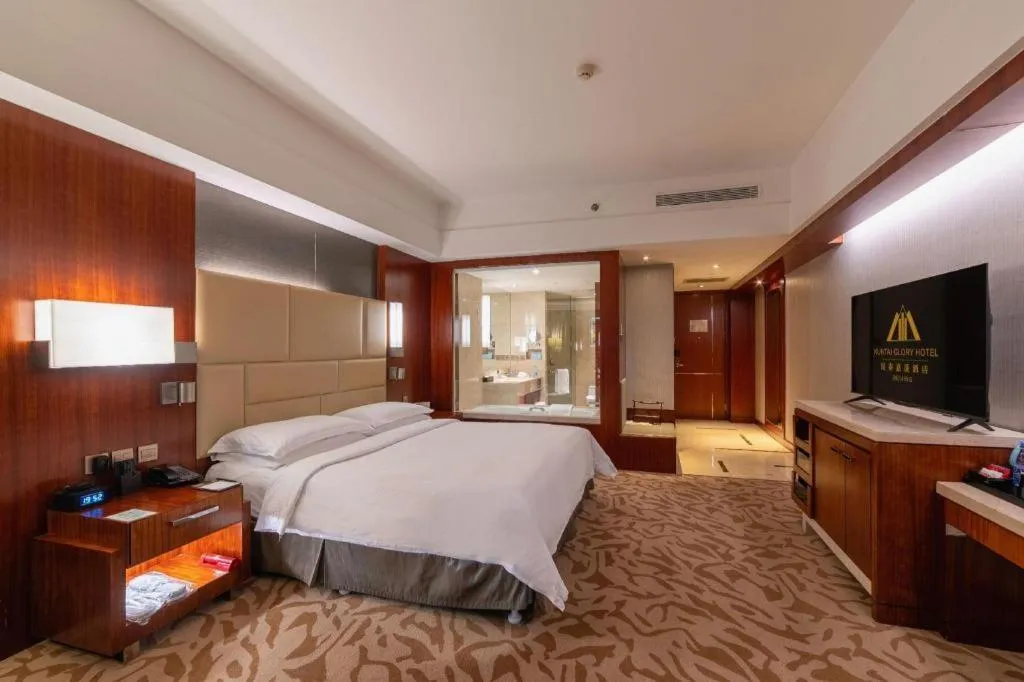 Bed in Kun Tai Glory Hotel Beijing Wangjing