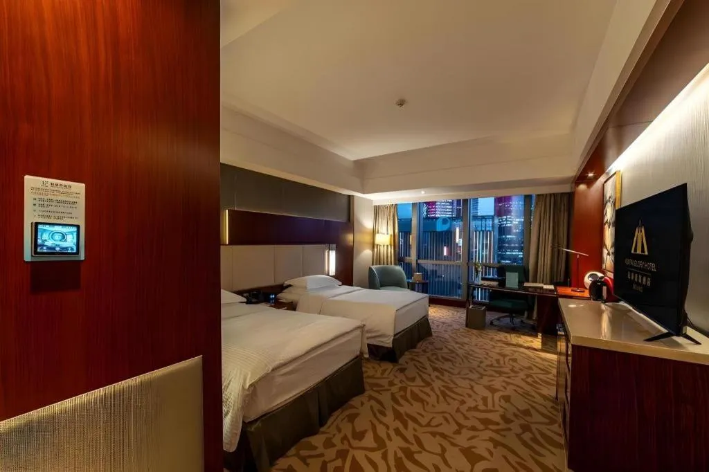 Bed in Kun Tai Glory Hotel Beijing Wangjing