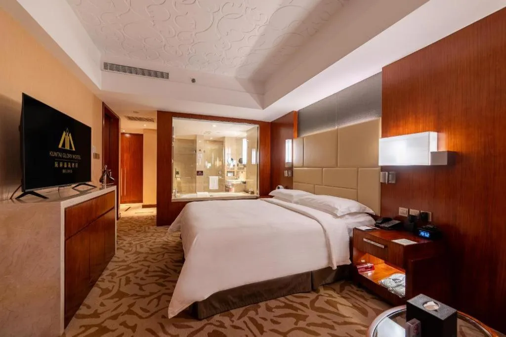 Bed in Kun Tai Glory Hotel Beijing Wangjing