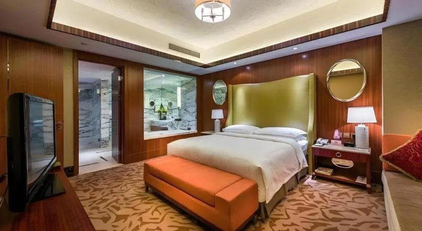 Bed in Kun Tai Glory Hotel Beijing Wangjing