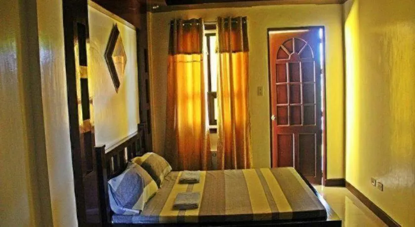 Bed in Costa Villa Beach Resort