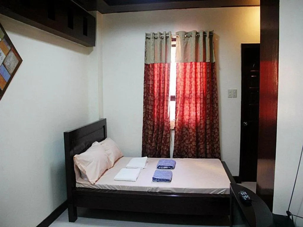 Bed in Costa Villa Beach Resort