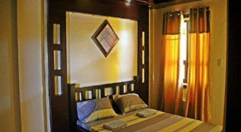Bed in Costa Villa Beach Resort