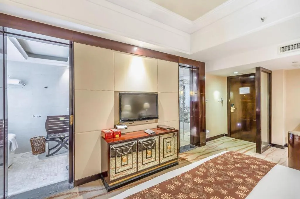 Bed in New Century Grand Hotel Xinxiang