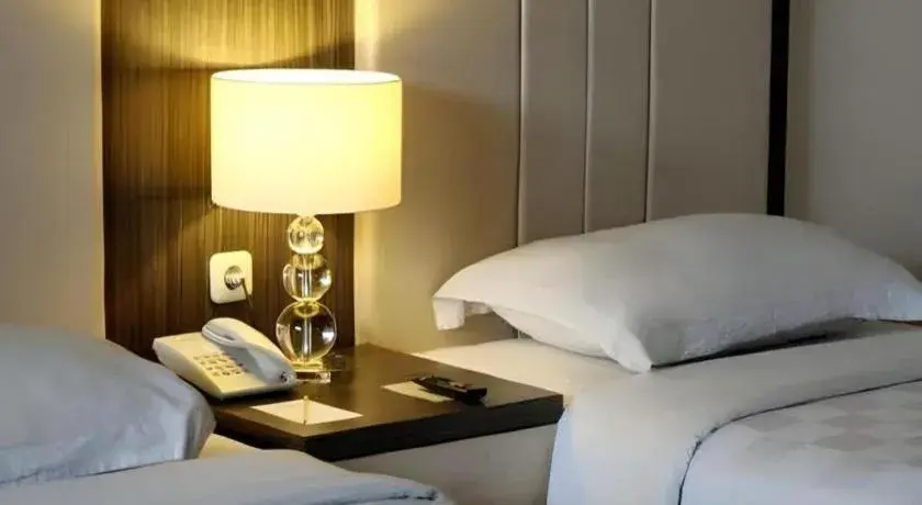 Bed in Bella Hotel Surabaya Bed in Bella Hotel Surabaya