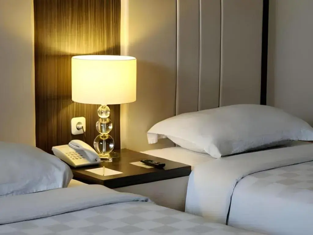 Bed in Bella Hotel Surabaya Bed in Bella Hotel Surabaya