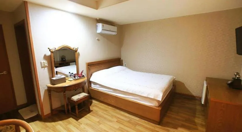 Bed in Monaco Hotel Jeju