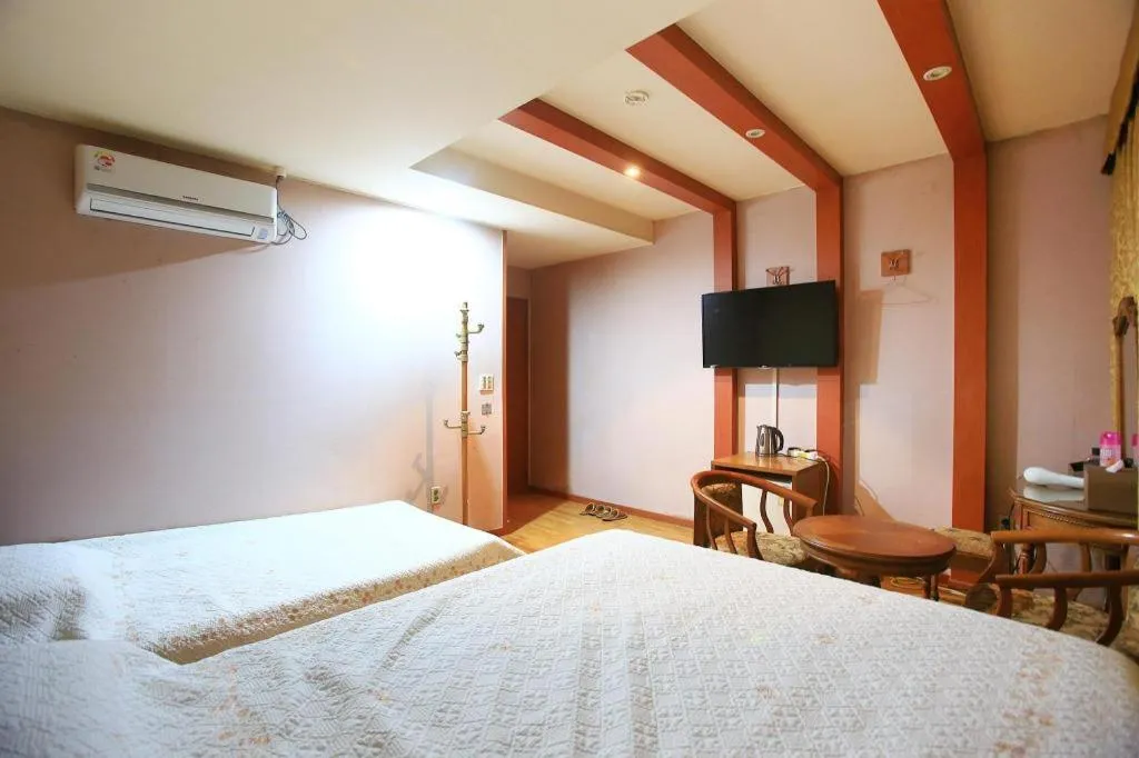 Bed in Monaco Hotel Jeju