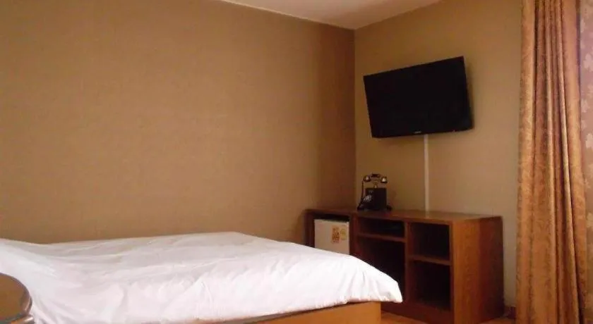 Bed in Monaco Hotel Jeju