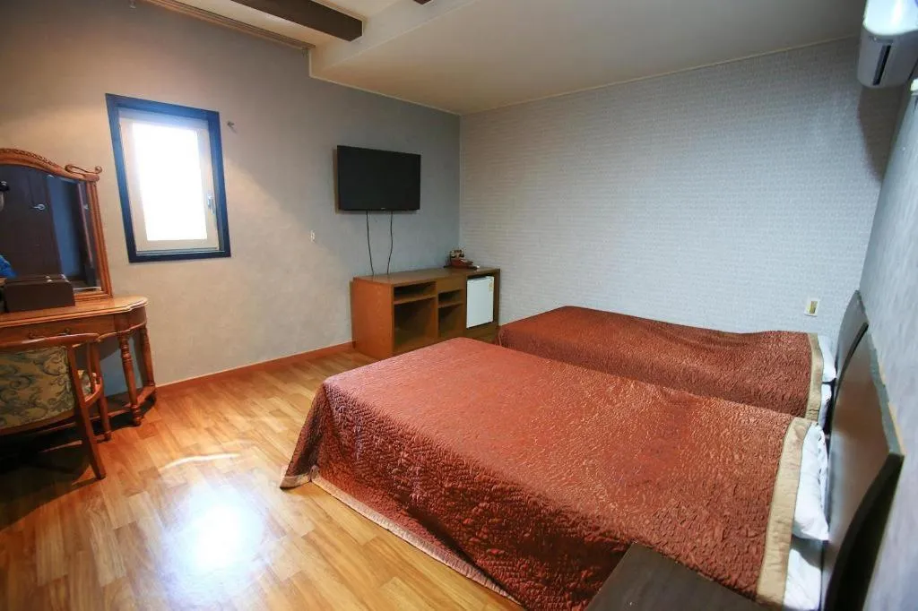 Bed in Monaco Hotel Jeju