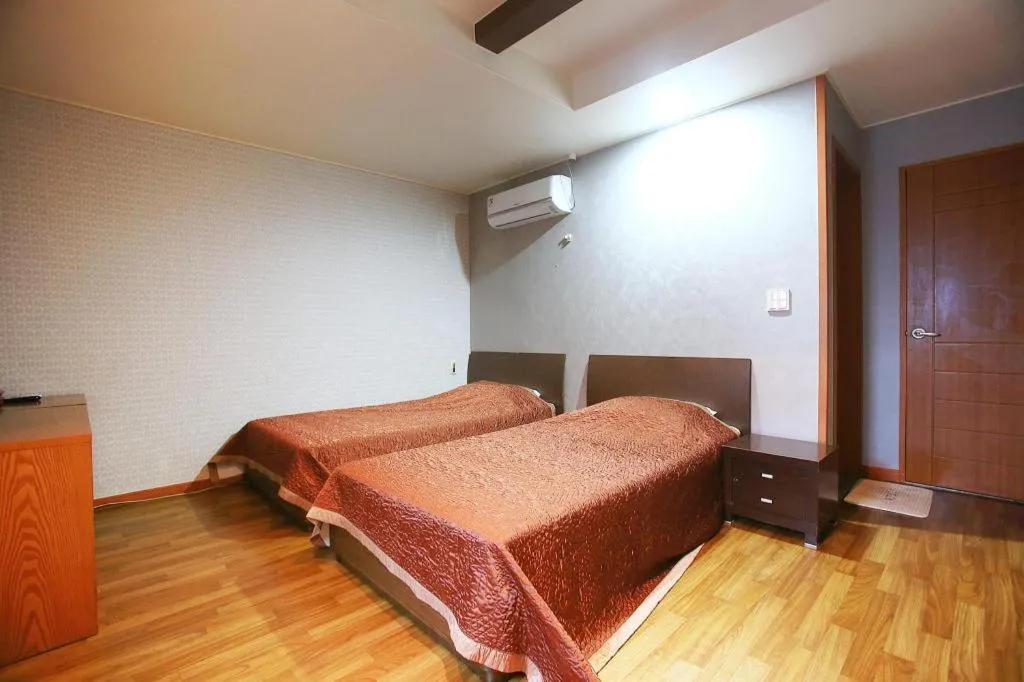 Bed in Monaco Hotel Jeju