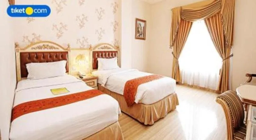 Bed in Hotel Grand Town