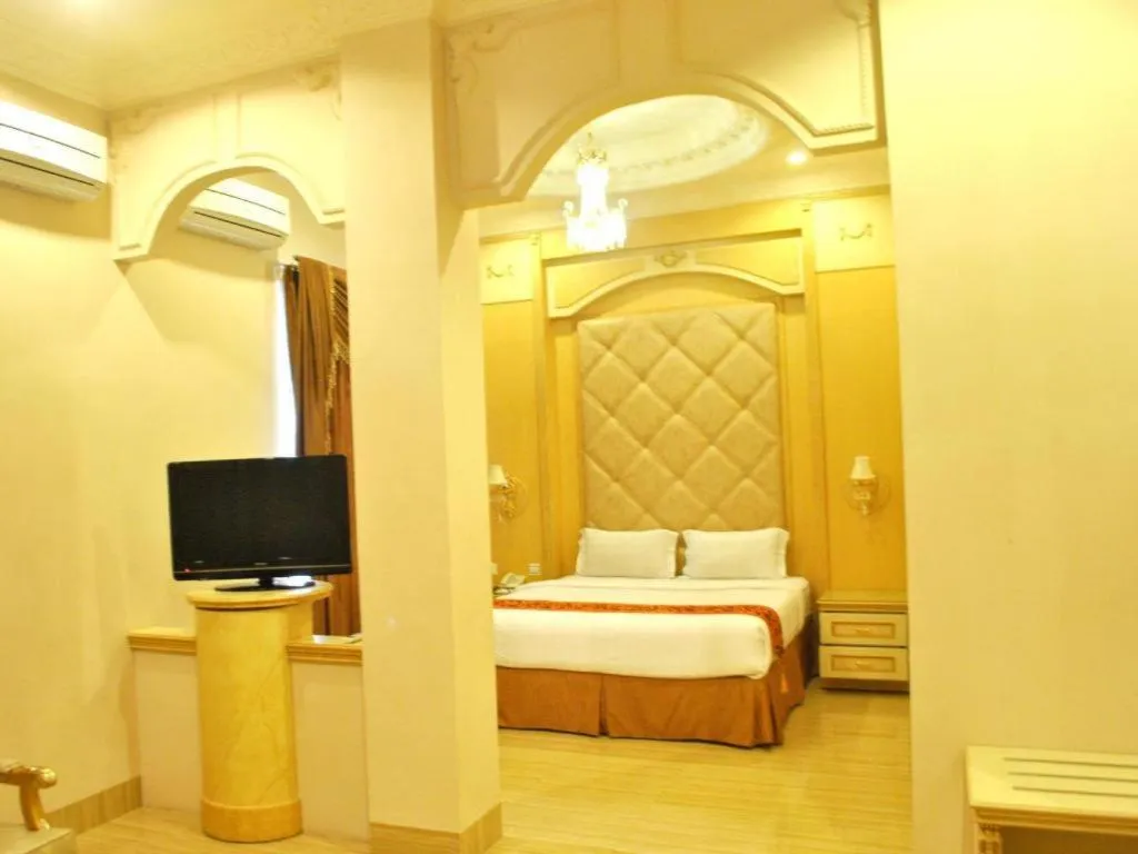 Bed in Hotel Grand Town