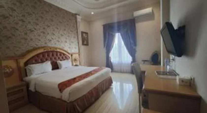 Bed in Hotel Grand Town