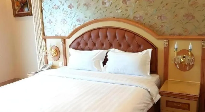 Bed in Hotel Grand Town