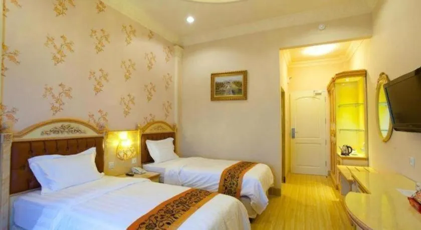 Bed in Hotel Grand Town