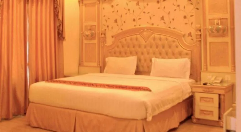 Bed in Hotel Grand Town