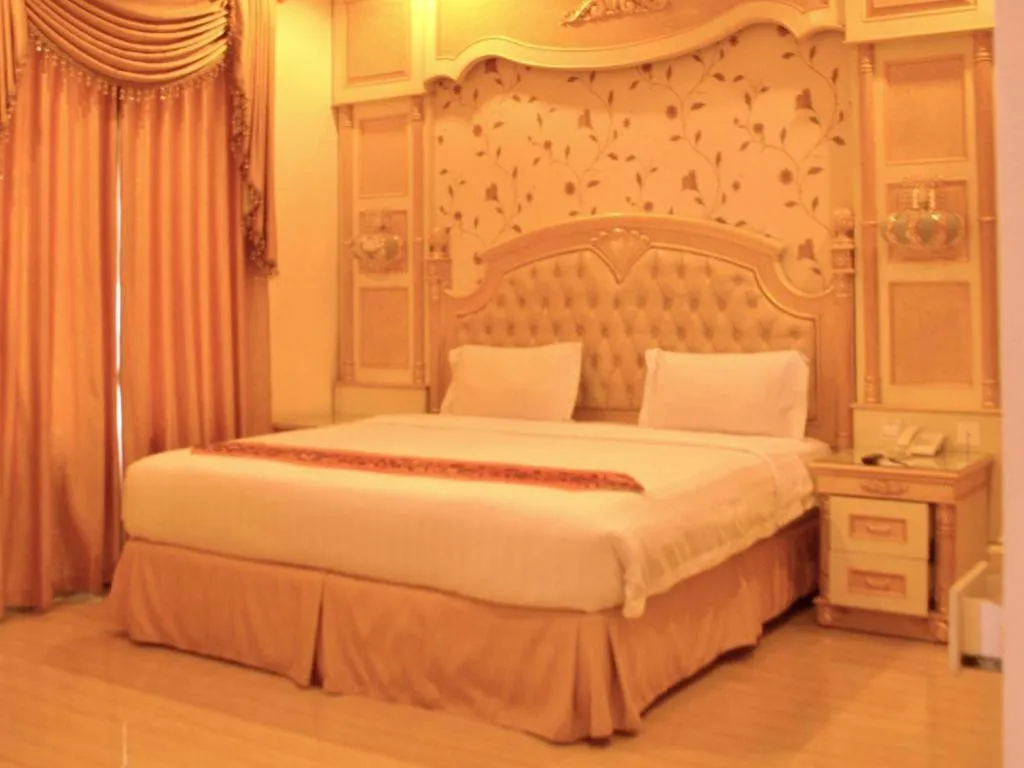 Bed in Hotel Grand Town