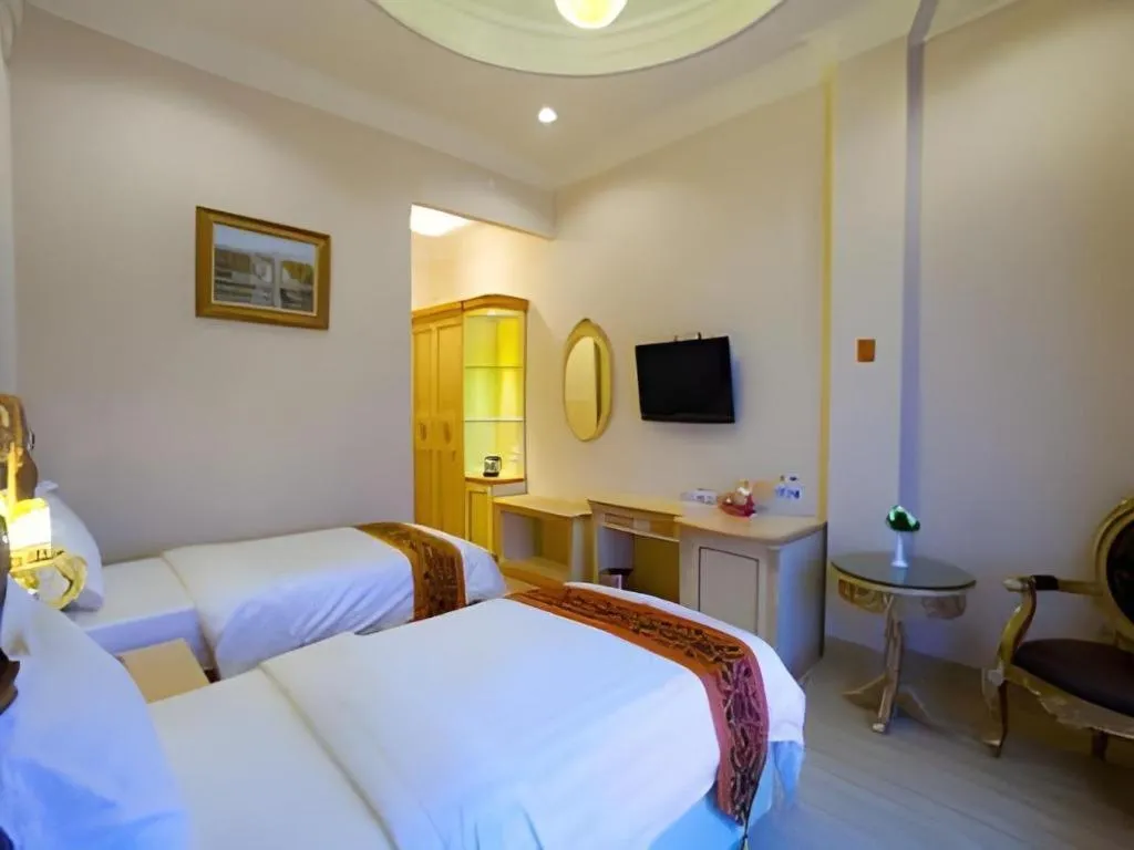 Bed in Hotel Grand Town