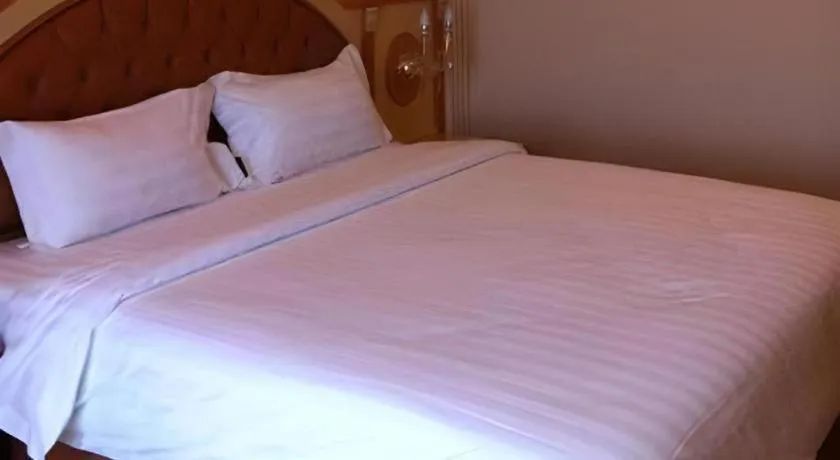 Bed in Hotel Grand Town