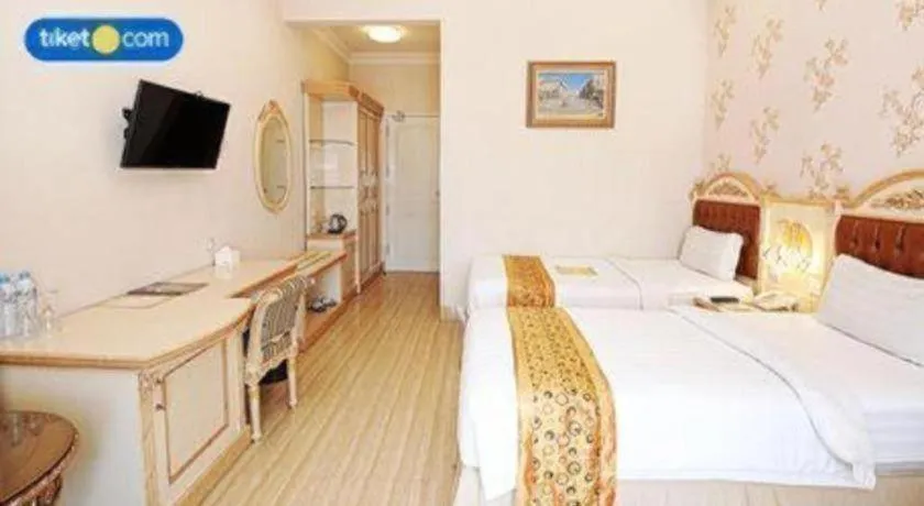 Bed in Hotel Grand Town