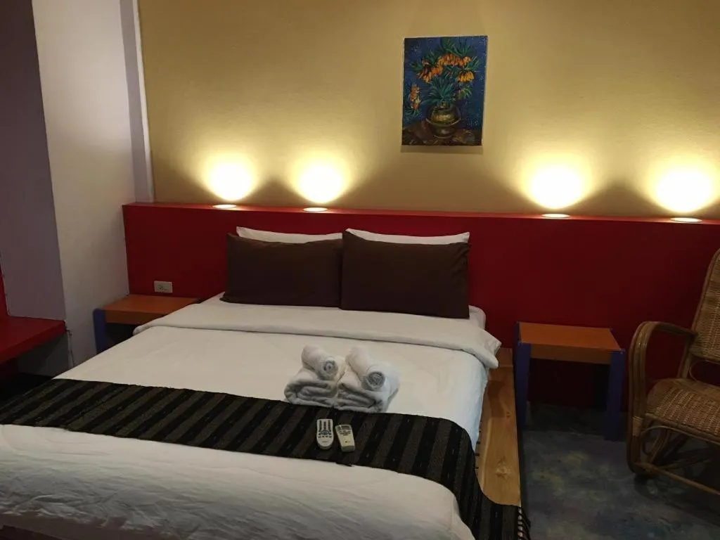 Bed in Ruen Kaew Resort