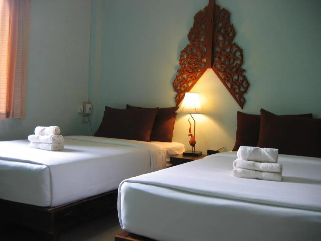 Bed in Ruen Kaew Resort