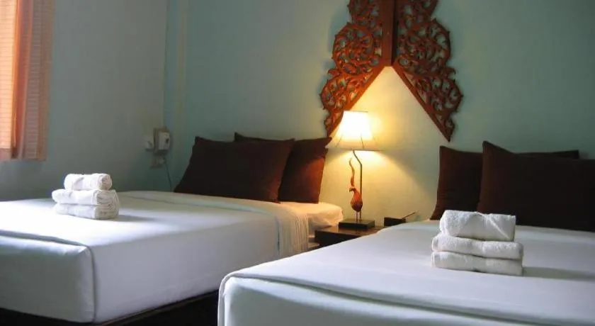 Bed in Ruen Kaew Resort