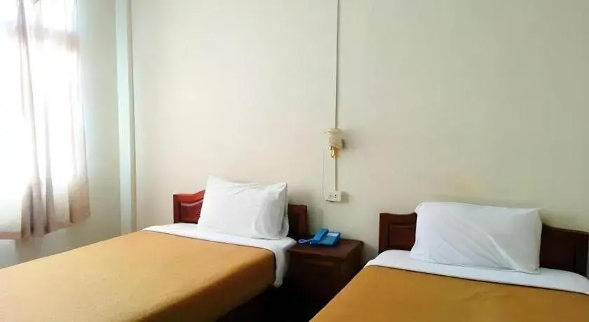 Bed in Souvanna Hotel Bed in Souvanna Hotel