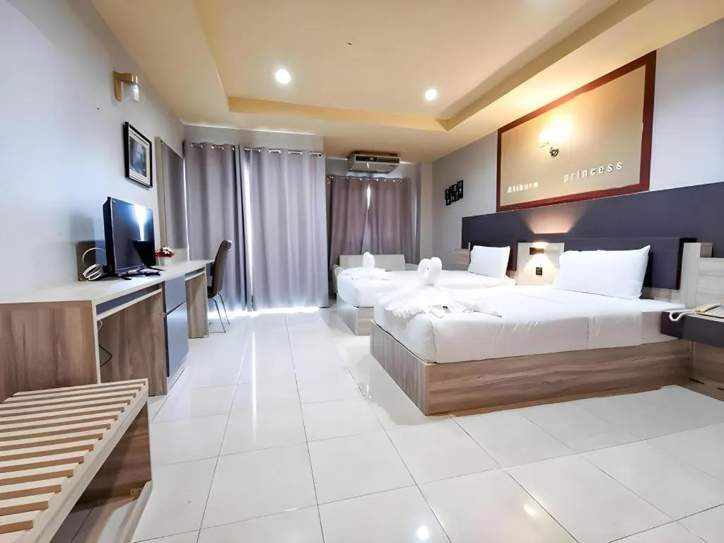 Bed in Atikarn Princess Hotel & Resort