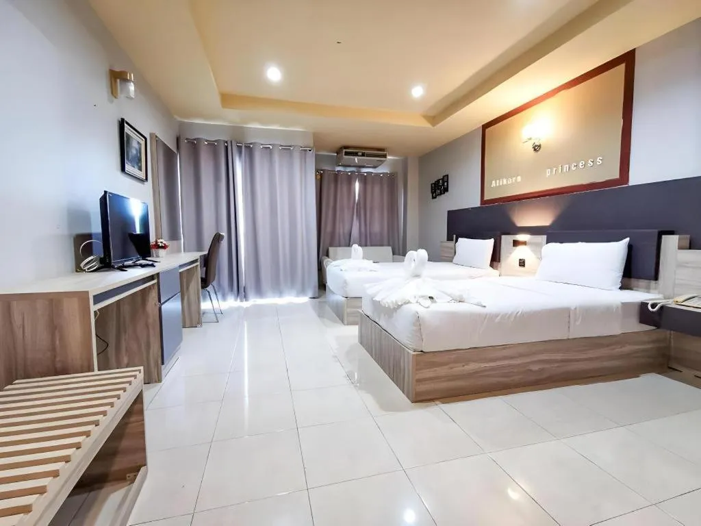 Bed in Atikarn Princess Hotel & Resort