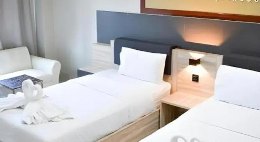 Bed in Atikarn Princess Hotel & Resort Bed in Atikarn Princess Hotel & Resort