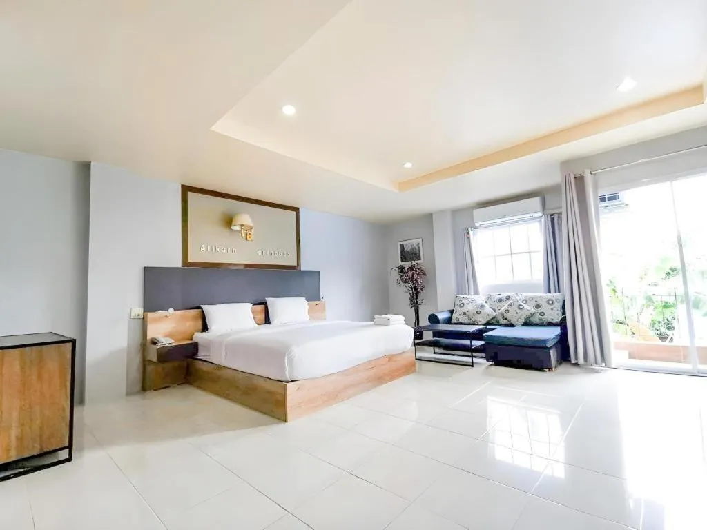 Bed in Atikarn Princess Hotel & Resort