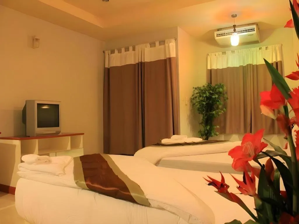 Bed in Atikarn Princess Hotel & Resort