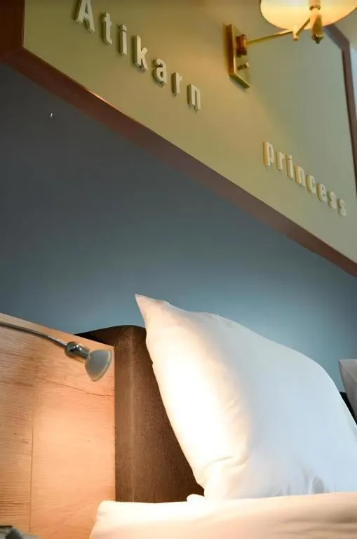 Bed in Atikarn Princess Hotel & Resort