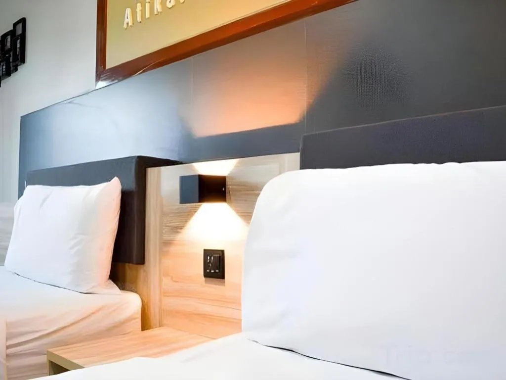 Bed in Atikarn Princess Hotel & Resort
