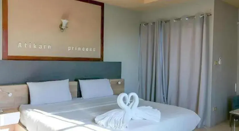 Bed in Atikarn Princess Hotel & Resort Bed in Atikarn Princess Hotel & Resort