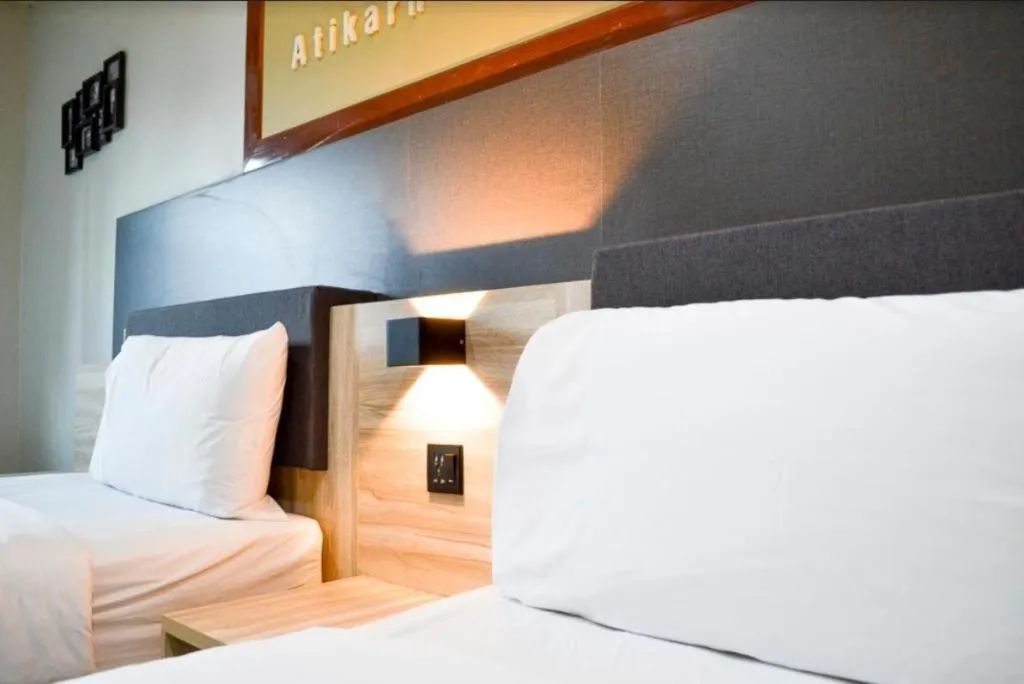 Bed in Atikarn Princess Hotel & Resort